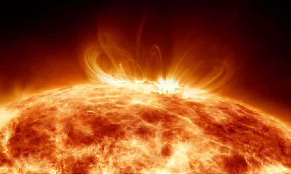 The sun seen in space with plasma oscillations occurring on the surface.
